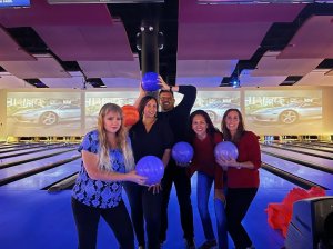 staff at Boca Jaw enjoying a game of bowling.